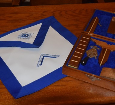 Working tools and apron of a freemason.