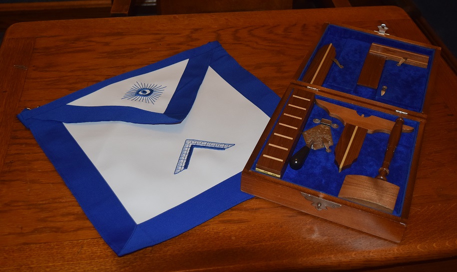 Working tools and apron of a freemason.